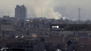 A plume of smoke rises following a reported explosion in Tehran on February 28, 2026. Two loud blasts were heard in Tehran on February 28 morning by AFP journalists, and two plumes of thick smoke were seen over the centre and east of the Iranian capital. Israel's defence ministry announced it had launched a "preemptive strike" on Iran as sirens sounded in Jerusalem and people across the country received phone alerts about an "extremely serious" threat