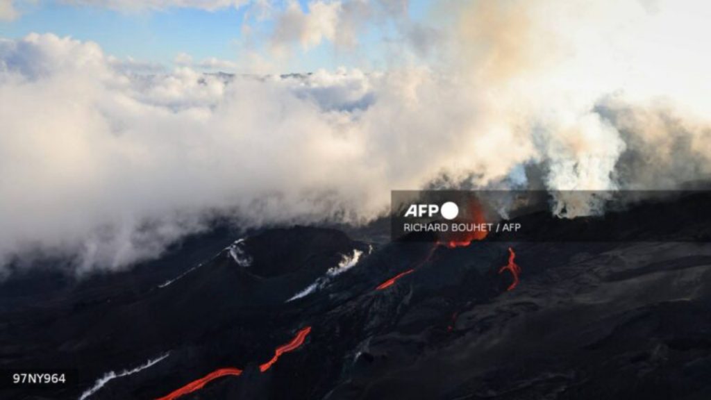 This aerial photograph shows the Piton de la Fournaise volcano erupting in the southeast of the French overseas island of La Reunion on February 15, 2026