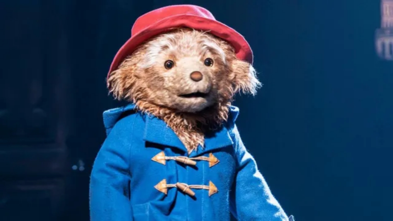 Paddington Bear performing on stage in Paddington The Musical at London’s Savoy Theatre