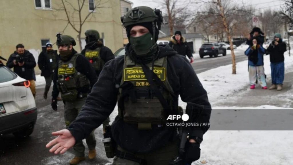 Federal agents patrol the Frogtown neighborhood while anti-ICE activists warn the community about their presence and oppose ongoing Immigration and Customs Enforcement detentions, part of heightened tensions following a federal immigration enforcement surge and recent shooting involving an ICE officer in St. Paul, Minnesota, on January 16, 2026 - National News