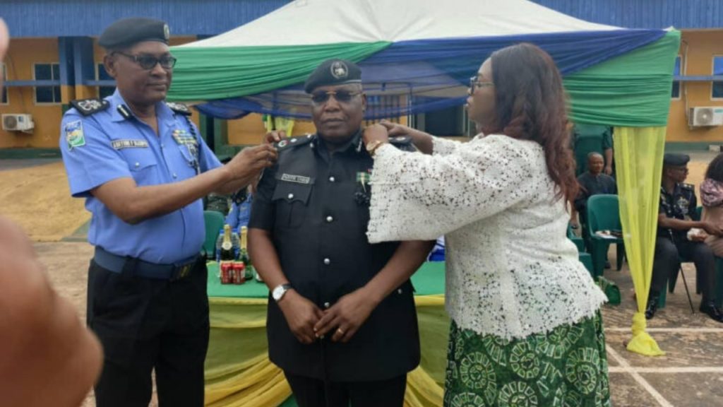 AIG Zone 13 decorating one of the newly-promoted officers - National News