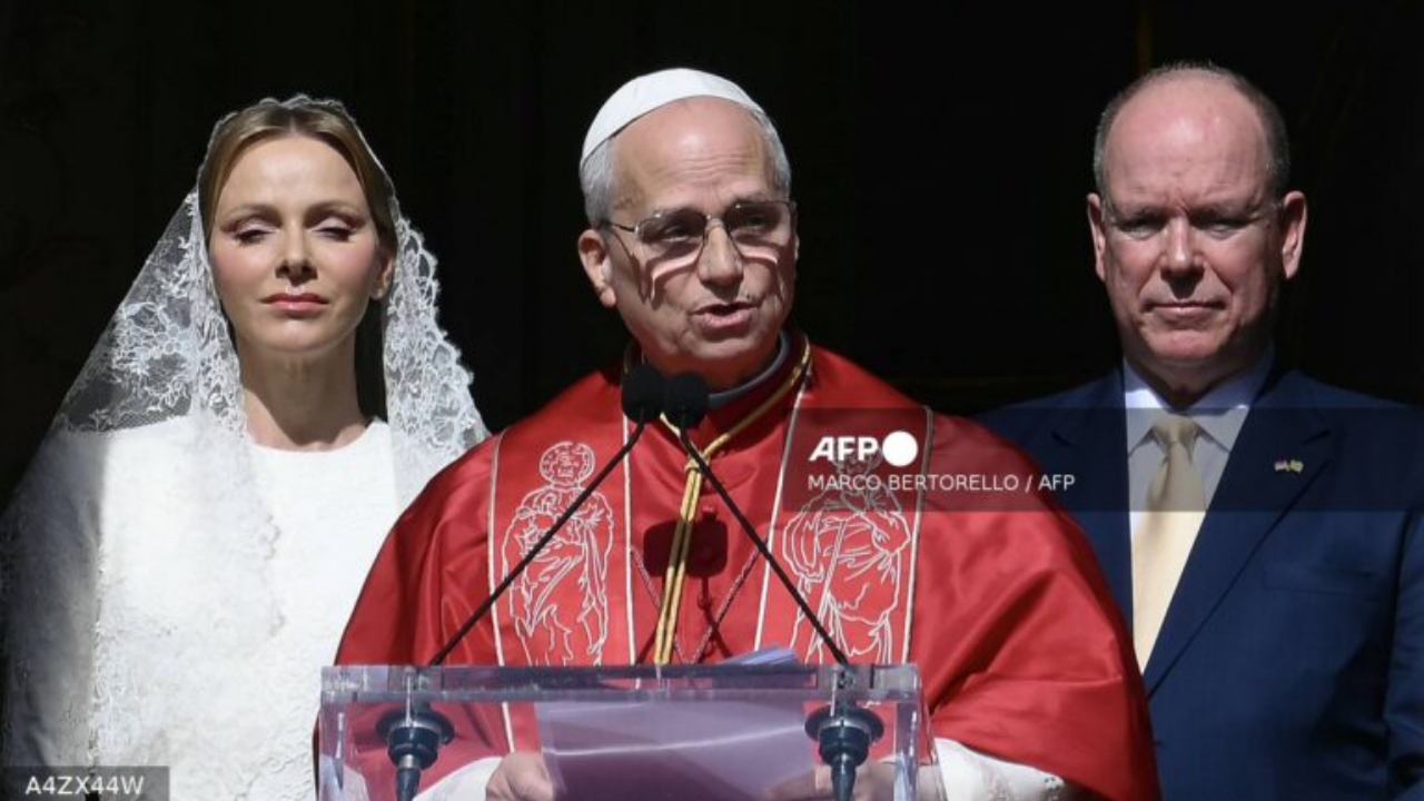 Pope Leo XIV gives a speech from the balcony next to Prince's Albert II of Monaco (R) and Princess Charlene of Monaco at the Prince's Palace of Monaco in Monte Carlo, Monaco, on March 28, 2026 - National News