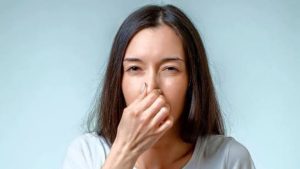 Image of someone trying to hum with nose closed - National News