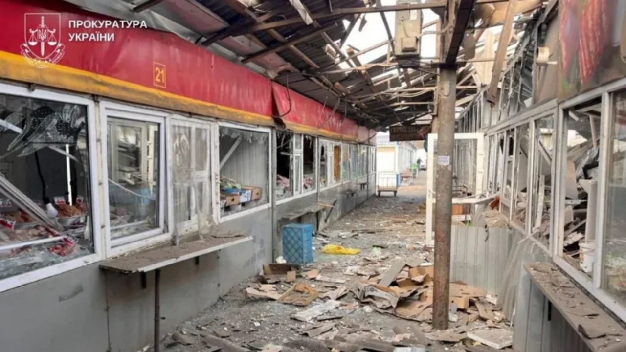 Destroyed market kiosks in Nikopol after Russian drone attack, showing scattered metal, glass, and debris - National News