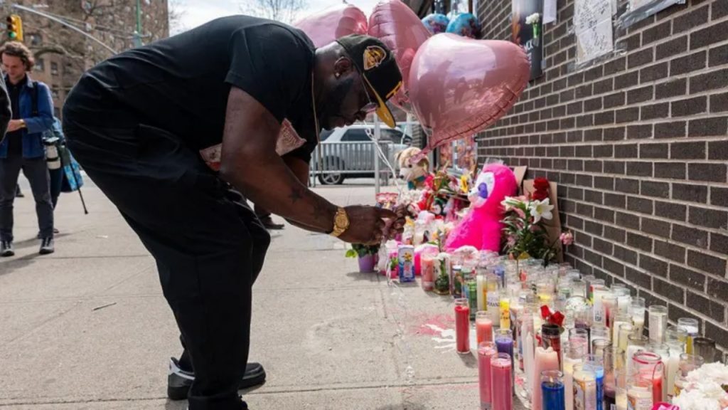 Memorial with balloons and candles for baby shot in stroller in Brooklyn - National News