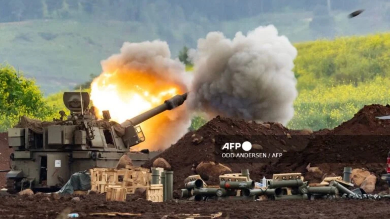 An Israeli self-propelled howitzer artillery gun fires rounds towards southern Lebanon from a position in the upper Galilee in northern Israel near the border on March 15, 2026 - National News