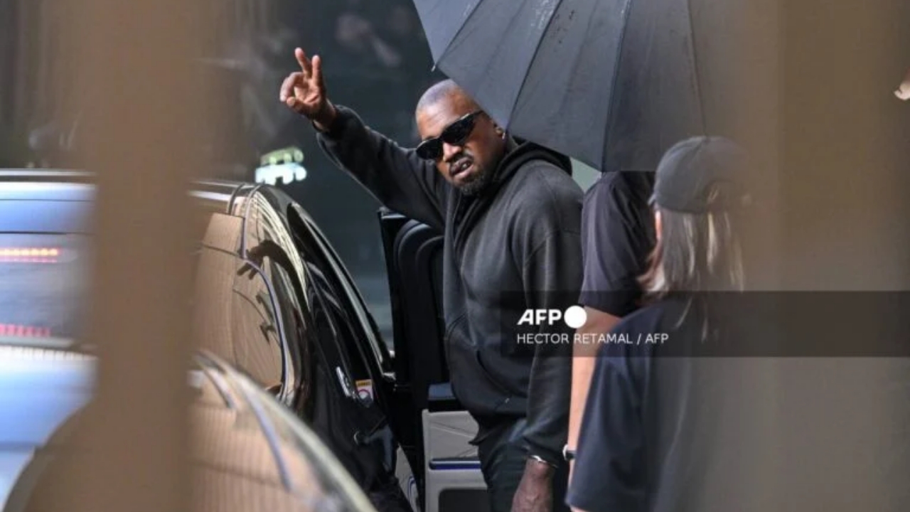 US rapper and producer Kanye West waves after arriving at Shanghai Pudong International Airport on July 11, 2025 - National News