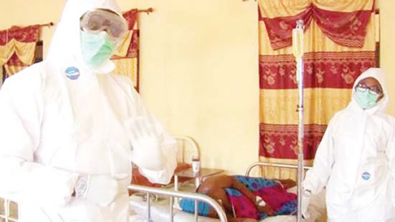 Doctors treating a Lassa Fever patient - National News