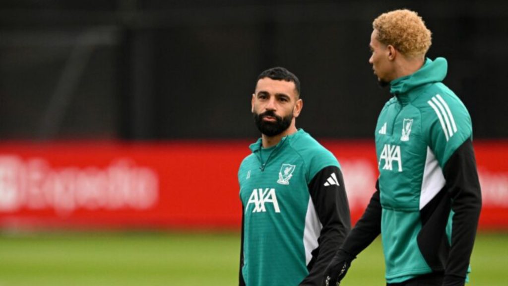 Liverpool's Egyptian striker #11 Mohamed Salah talks to Liverpool's French striker #22 Hugo Ekitike during a team training session at their training ground in Kirkby, Liverpool, north-west England on January 20, 2026, on the eve of their UEFA Champions League, league phase football match against Olympique Marseille in Marseille - National News