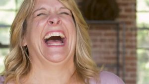 Illustration image of a woman laughing - National News