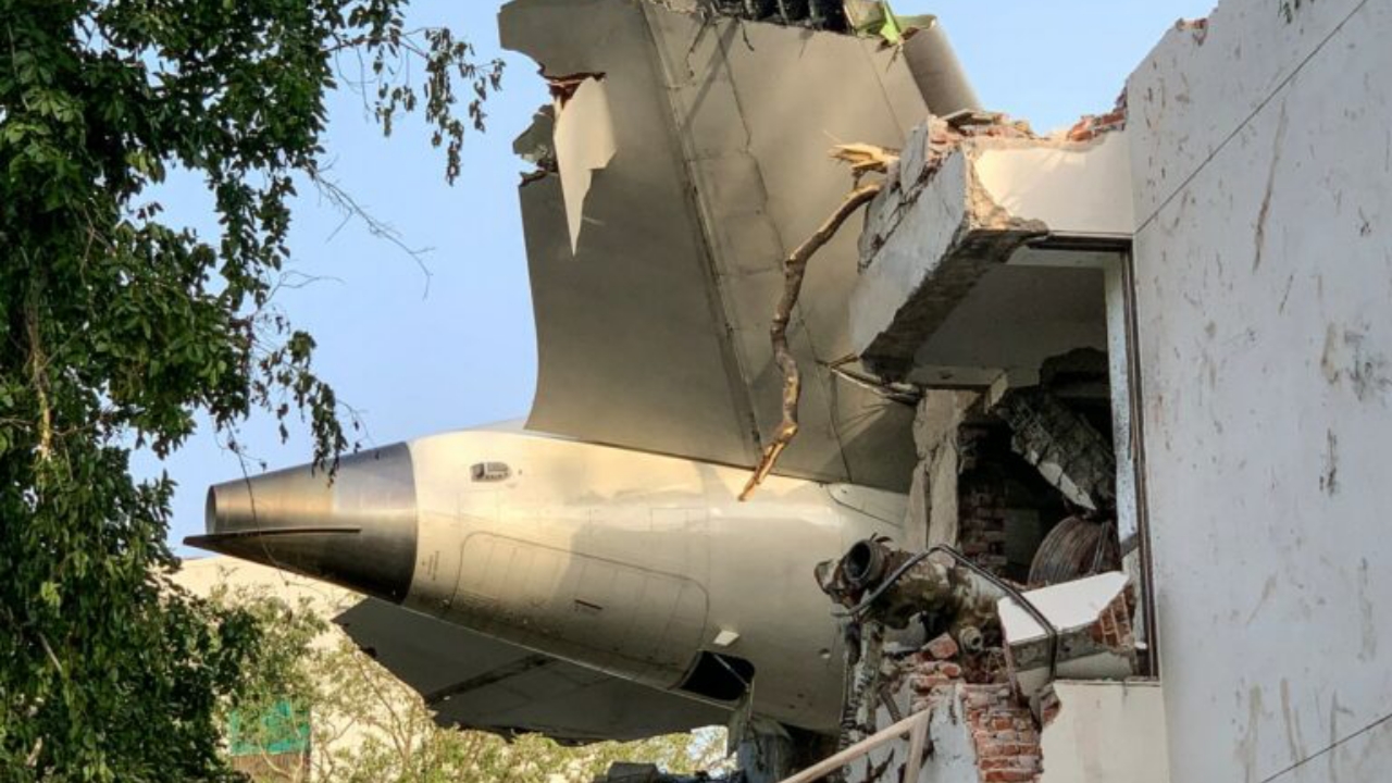 The back of Air India flight 171 is pictured at the site after it crashed in a residential area near the airport in Ahmedabad on June 12, 2025. A London-bound passenger plane crashed in the Indian city of Ahmedabad on June 12 and all 242 people on board were believed killed, with the jet smashing into buildings housing doctors and their families - National News