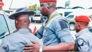 The accused Customs officer is ushered into a vehicle after being paraded - National News