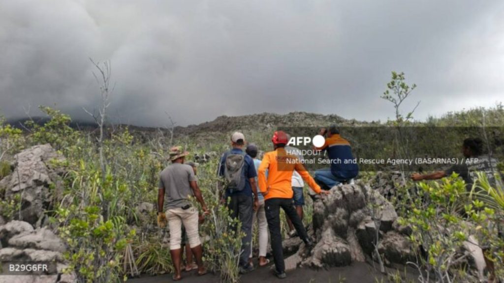 A handout picture taken and released on May 8, 2026 by Indonesia's National Search and Rescue Agency (BASARNAS) shows rescue workers standing by after the volcanic eruption of Mount Dukono in North Halmahera, North Maluku - National News
