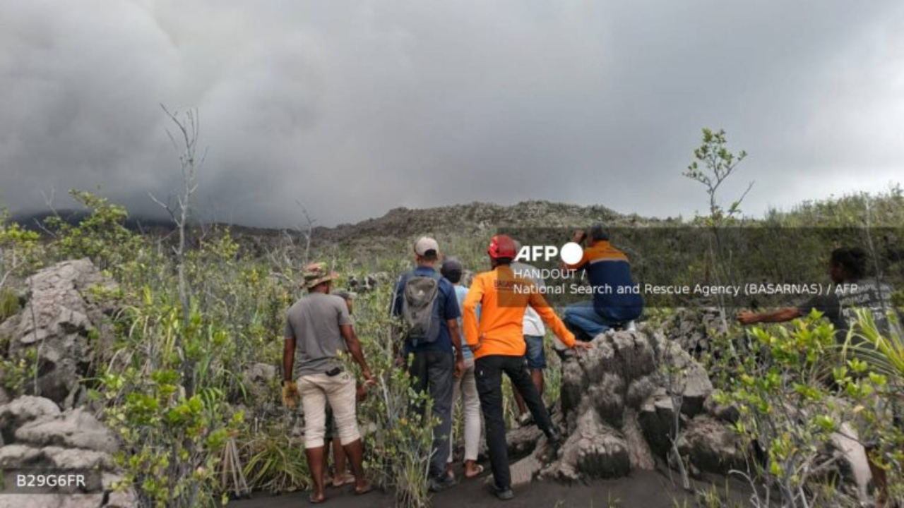 A handout picture taken and released on May 8, 2026 by Indonesia's National Search and Rescue Agency (BASARNAS) shows rescue workers standing by after the volcanic eruption of Mount Dukono in North Halmahera, North Maluku - National News