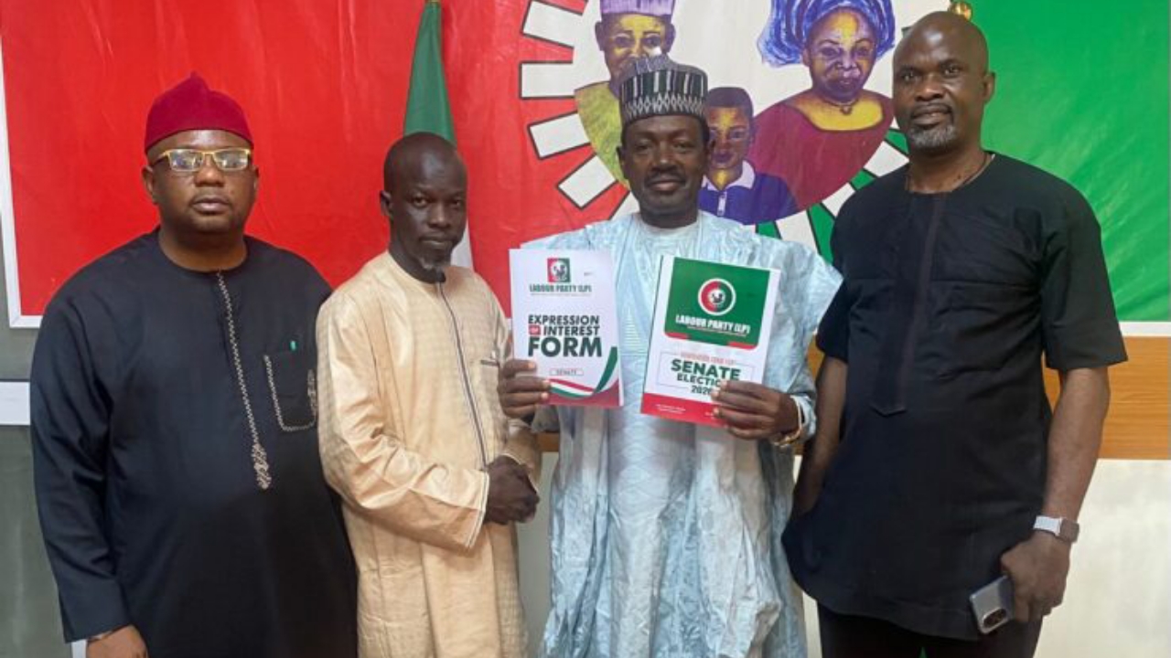 Former Minister of Information, Labaran Maku (in white) surrounded by his loyalists shortly after procuring his nomination form at LP secretariat in Abuja on Wednesday - National News
