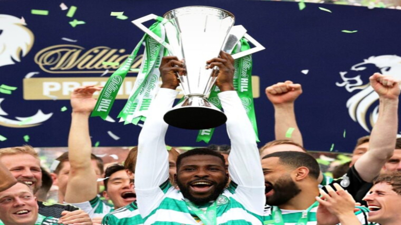 Kelechi Iheanacho lifts the Scottish Premiership trophy as Celtic celebrate their title-winning season after a dramatic comeback victory over Hearts in Glasgow on Saturday - National News