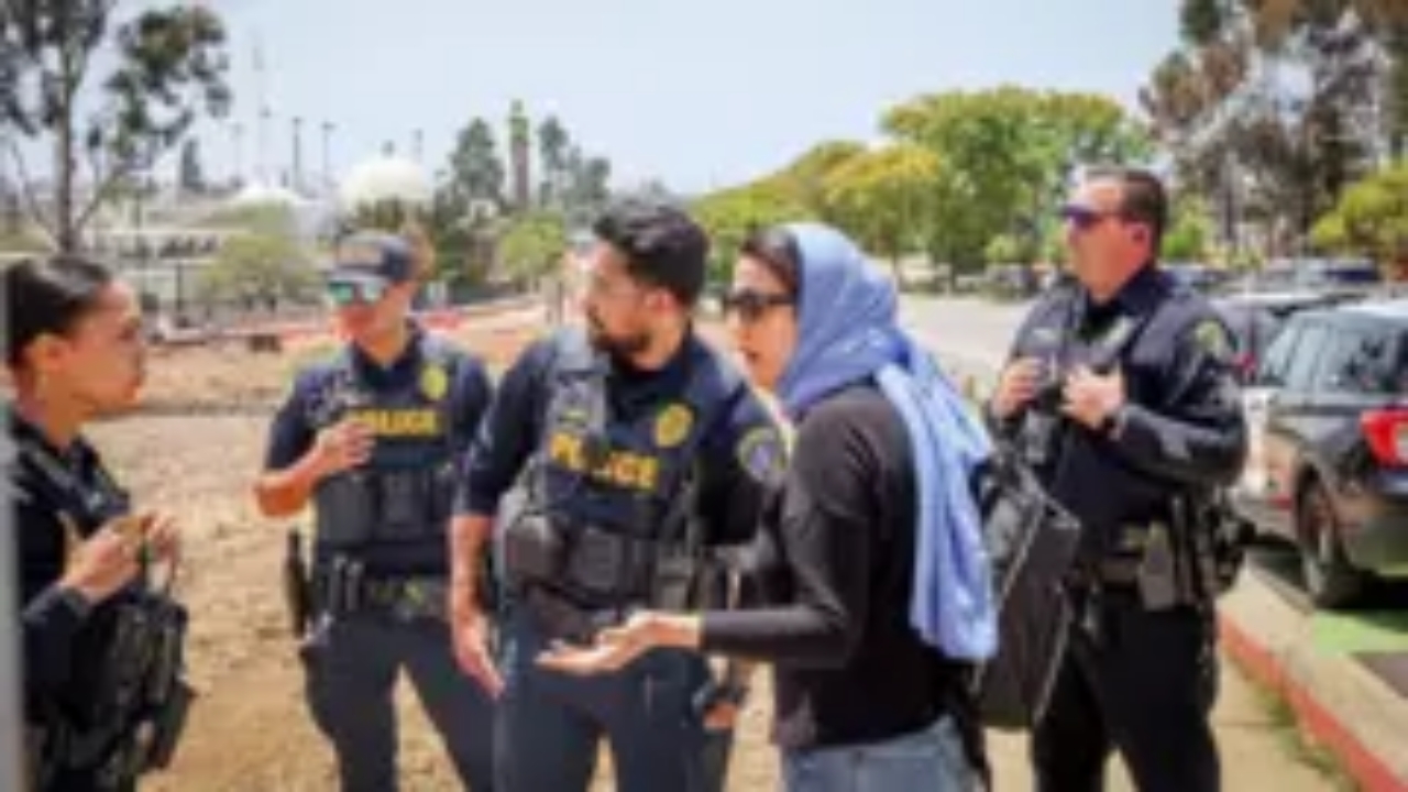 Security personnel and police outside the Islamic Center of San Diego following a deadly mosque shooting incident - National News