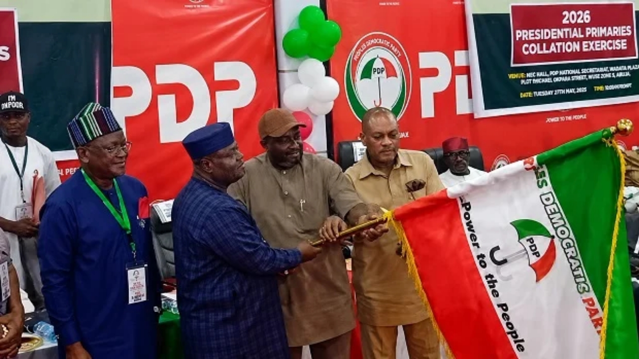 Senator Sandy Onor (m) being handed the PDP flag after emerging the party’s presidential candidate for 2027 - National News